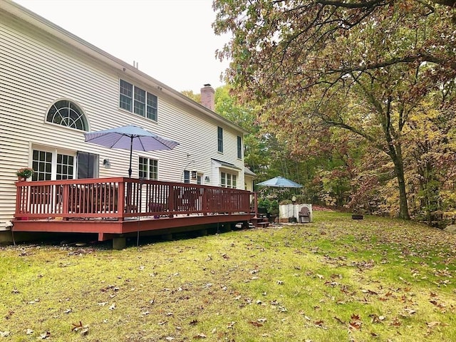 6 Everett Cir, Hopkinton, MA 01748 - back of house with a yard, a wooden deck, and a chimney