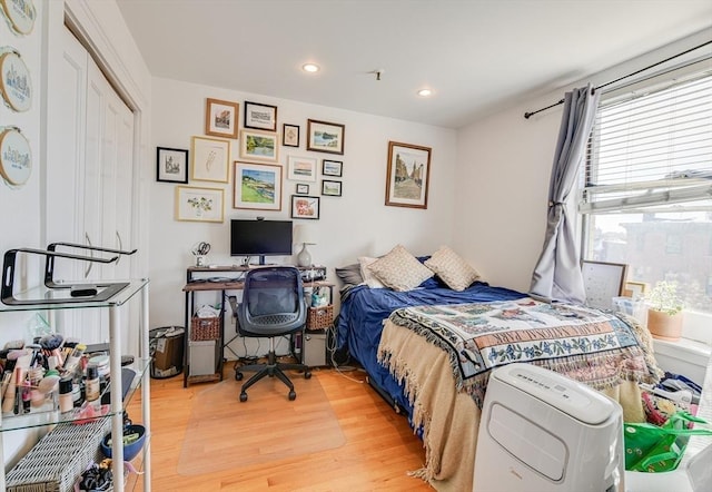 492 Massachusetts Ave Unit 53, Boston, MA 02118 - bedroom with light wood finished floors and recessed lighting