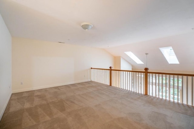 43 Blossom Sq Unit 43, Holden, MA 01520 - additional living space with a skylight, carpet, and vaulted ceiling