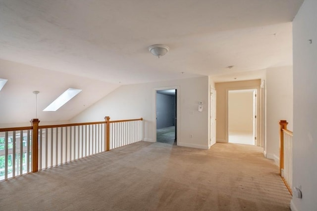 43 Blossom Sq Unit 43, Holden, MA 01520 - additional living space featuring a skylight, light carpet, and vaulted ceiling