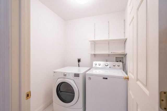 43 Blossom Sq Unit 43, Holden, MA 01520 - laundry area with washer and dryer and baseboards
