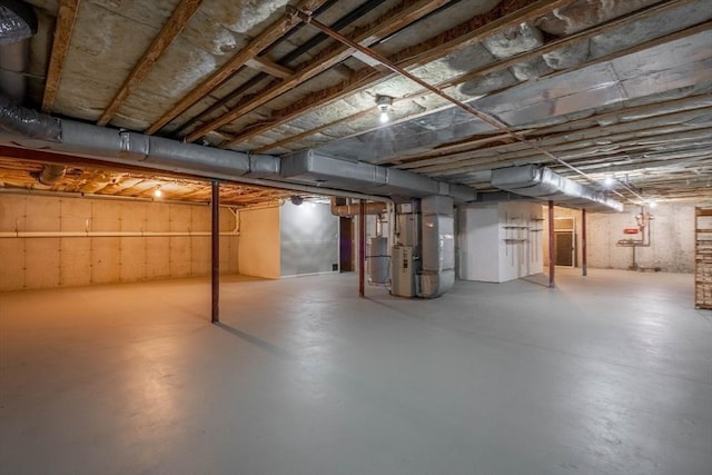43 Blossom Sq Unit 43, Holden, MA 01520 - unfinished below grade area featuring heating unit and water heater