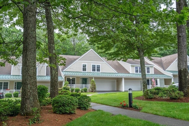 43 Blossom Sq Unit 43, Holden, MA 01520 - view of front of property featuring a metal roof, a front yard, and a standing seam roof