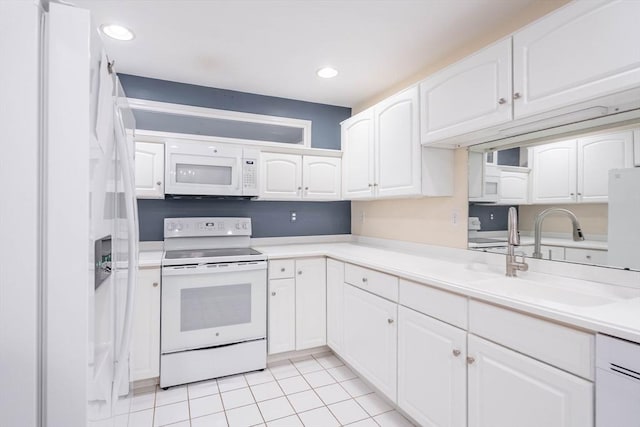 43 Blossom Sq Unit 43, Holden, MA 01520 - kitchen with white appliances, white cabinets, light tile patterned floors, light countertops, and recessed lighting