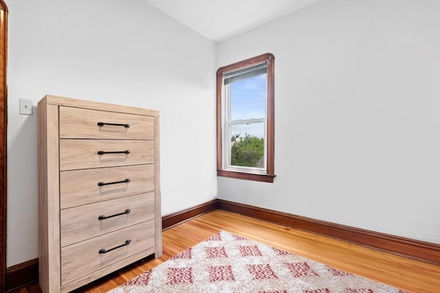 570 William St, Fall River, MA 02721 - bedroom with light wood-style flooring and baseboards