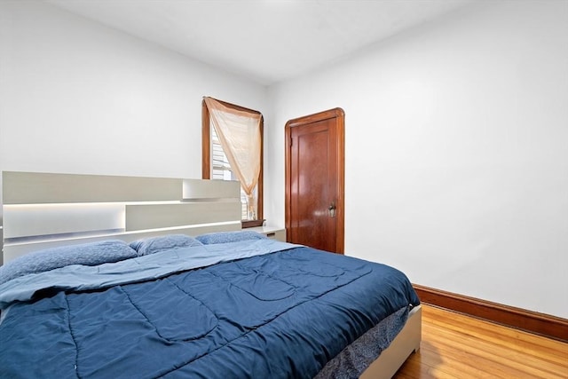 570 William St, Fall River, MA 02721 - bedroom featuring baseboards and wood finished floors