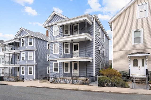 570 William St, Fall River, MA 02721 - view of front of house with a balcony and covered porch