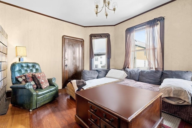 570 William St, Fall River, MA 02721 - living room featuring a chandelier, dark wood-style floors, and crown molding