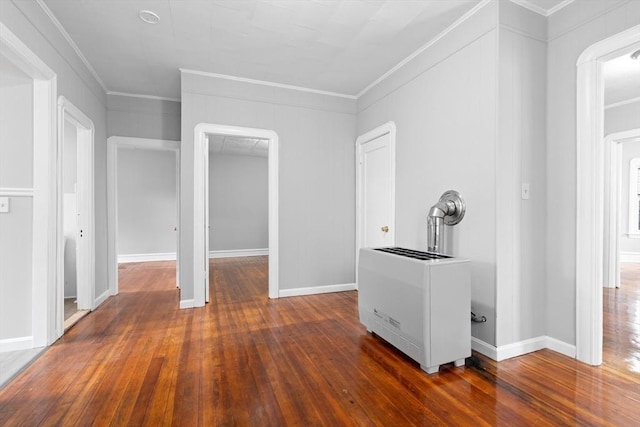 570 William St, Fall River, MA 02721 - interior space featuring crown molding, hardwood / wood-style flooring, baseboards, and heating unit