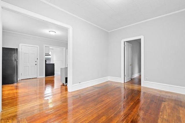 570 William St, Fall River, MA 02721 - empty room with crown molding, hardwood / wood-style flooring, and baseboards
