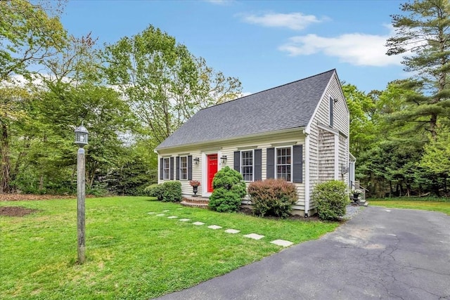 13 Pickerel Way, Sandwich, MA 02644 - cape cod home featuring roof with shingles, a front yard, and driveway