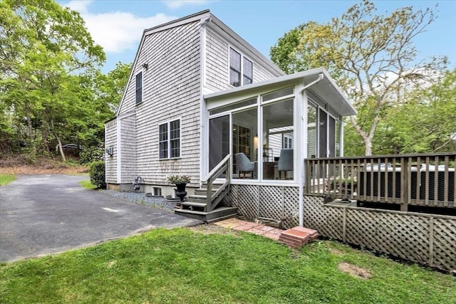 13 Pickerel Way, Sandwich, MA 02644 - back of house featuring a sunroom and a yard