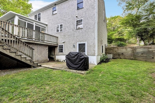 13 Pickerel Way, Sandwich, MA 02644 - rear view of property featuring a deck, a sunroom, cooling unit, stairs, and a patio area