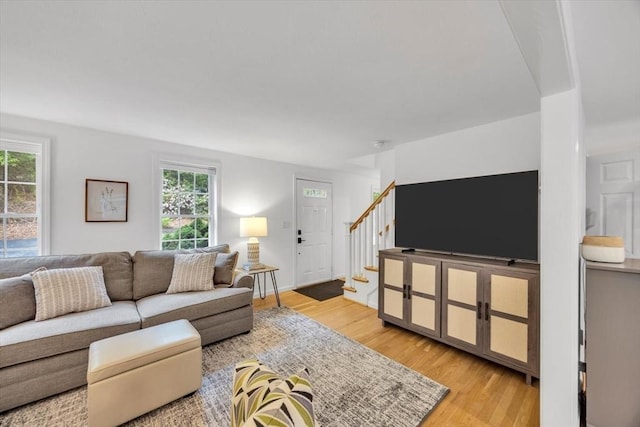 13 Pickerel Way, Sandwich, MA 02644 - living room featuring light wood-style floors and stairs