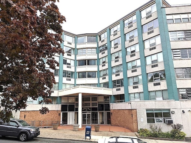 view of building exterior featuring cooling unit