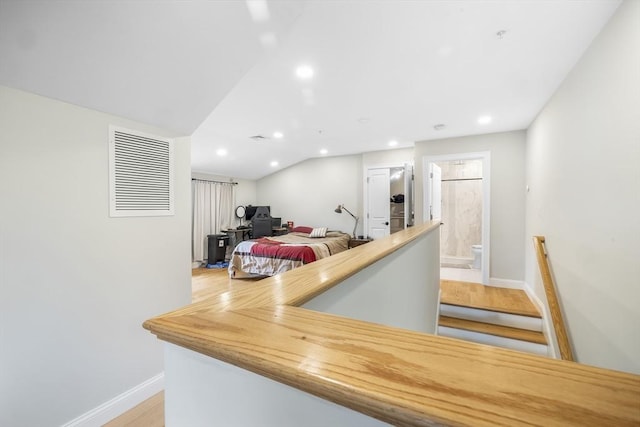 kitchen featuring recessed lighting, baseboards, visible vents, and light wood finished floors