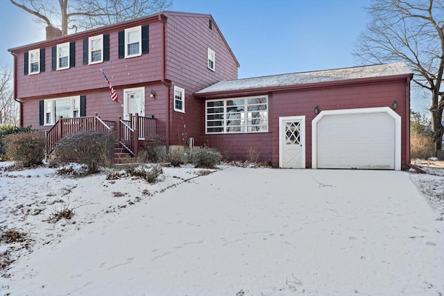 view of front of home with a garage