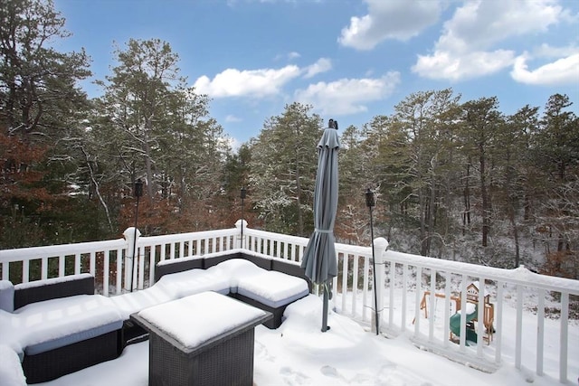 view of snow covered deck