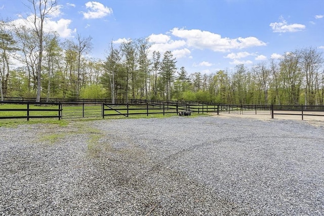 view of street with an enclosed horse arena
