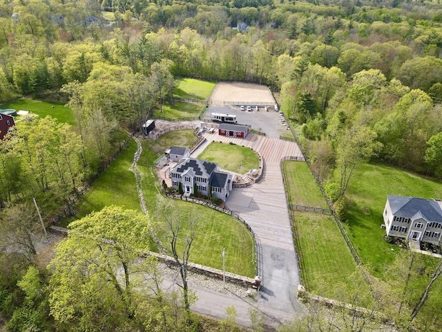 view from above of property with a forest