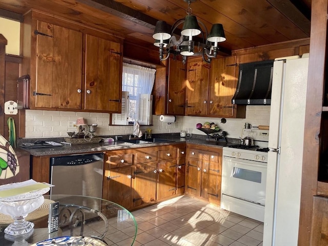 kitchen featuring dark countertops, white appliances, brown cabinets, and ventilation hood