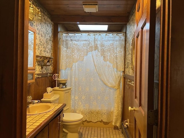 bathroom with curtained shower, toilet, wood ceiling, vanity, and wallpapered walls