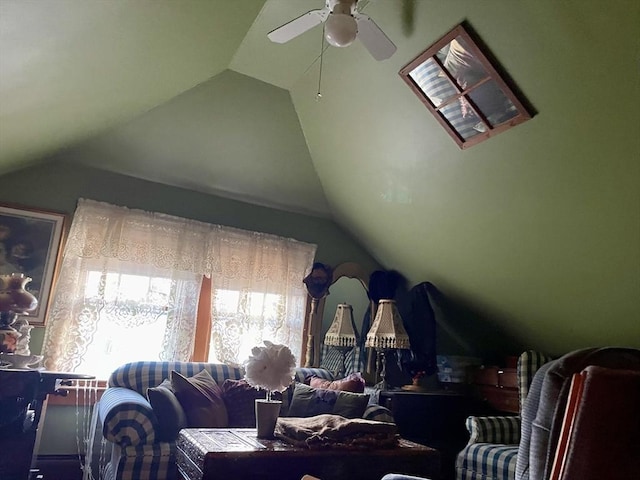 bonus room with vaulted ceiling and a ceiling fan