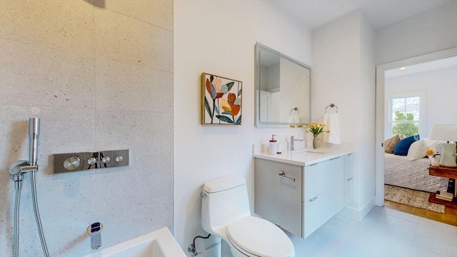 140 Columbia St Unit 2, Brookline, MA 02446 - ensuite bathroom featuring toilet and vanity