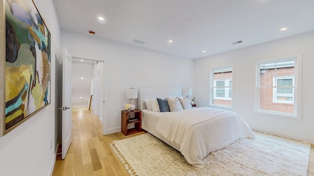 140 Columbia St Unit 2, Brookline, MA 02446 - bedroom with light wood-style flooring, recessed lighting, and baseboards