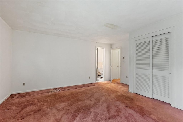 12 Debra Ln, Framingham, MA 01701 - unfurnished bedroom with light colored carpet, baseboards, ensuite bathroom, and a closet