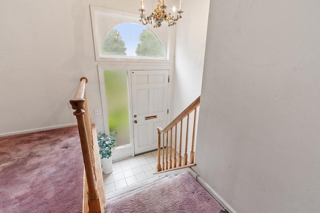 12 Debra Ln, Framingham, MA 01701 - entrance foyer featuring a chandelier, stairs, healthy amount of natural light, and carpet