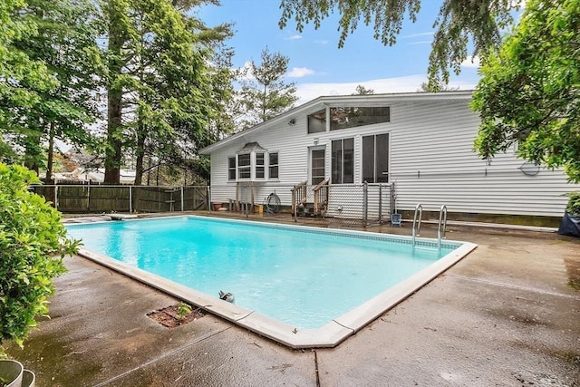 12 Debra Ln, Framingham, MA 01701 - view of swimming pool featuring a patio area