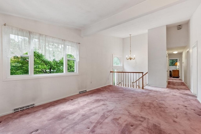 12 Debra Ln, Framingham, MA 01701 - empty room with carpet, beam ceiling, a chandelier, and baseboards