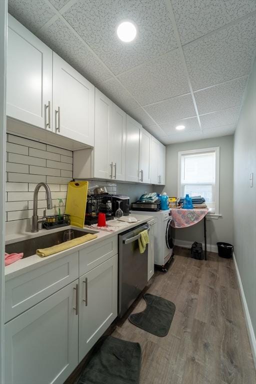 washroom featuring sink and dark hardwood / wood-style flooring