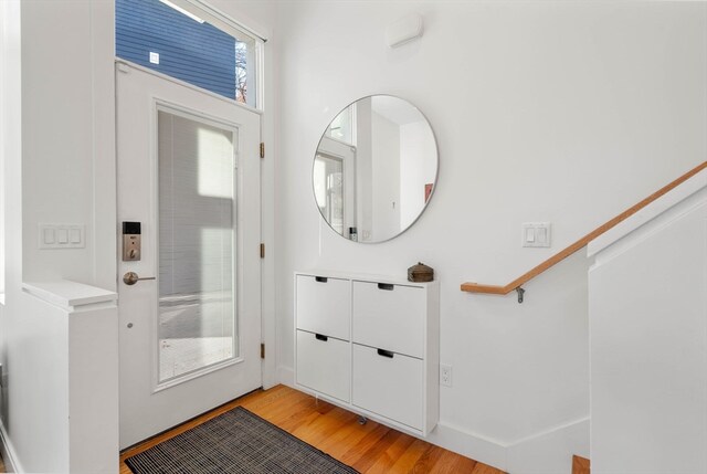 entrance foyer with light wood-type flooring