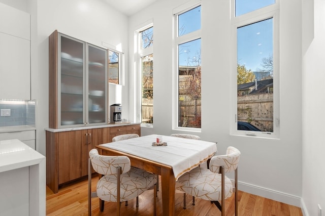 dining space featuring light hardwood / wood-style floors