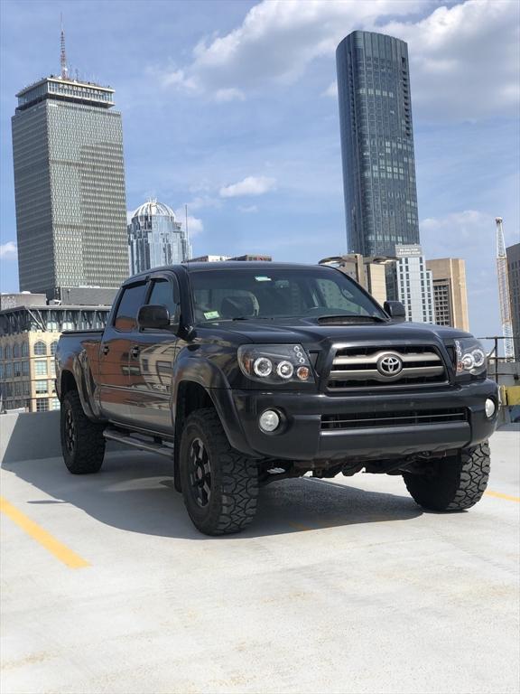 view of parking with a view of city