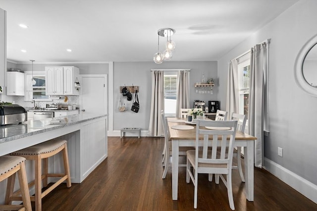 20-A Franklin St, Peabody, MA 01960 - dining room with dark wood-style flooring, healthy amount of natural light, and recessed lighting