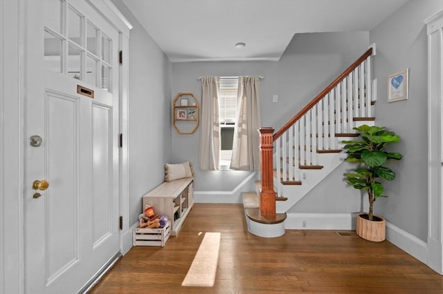 20-A Franklin St, Peabody, MA 01960 - foyer entrance featuring wood finished floors and stairs