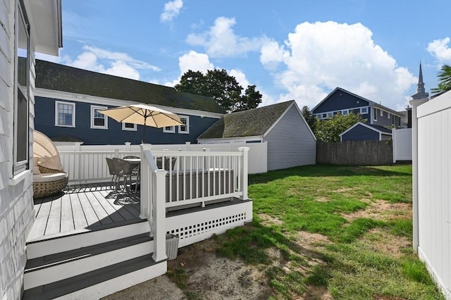 20-A Franklin St, Peabody, MA 01960 - view of yard featuring a deck, outdoor dining area, and an outdoor structure