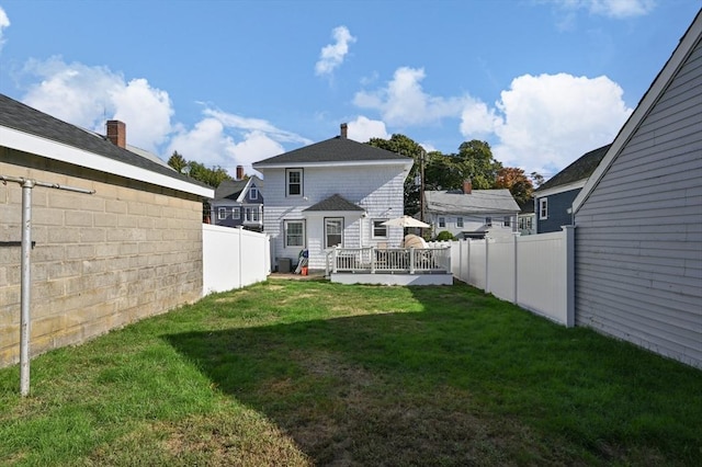 20-A Franklin St, Peabody, MA 01960 - fenced backyard with a wooden deck