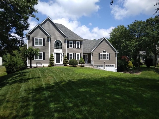 6 Cedar Creek Dr, Attleboro, MA 02703 - colonial-style house featuring an attached garage and a front yard