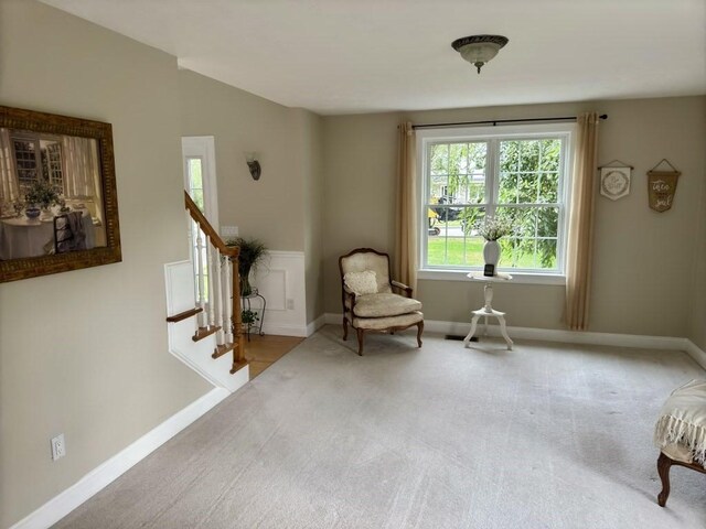 6 Cedar Creek Dr, Attleboro, MA 02703 - living area with carpet floors, baseboards, and stairway