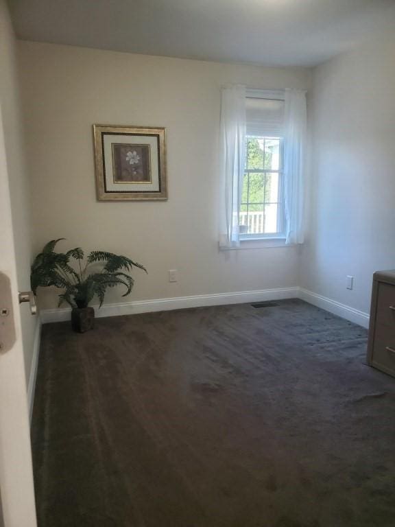 6 Cedar Creek Dr, Attleboro, MA 02703 - spare room featuring baseboards, visible vents, and dark carpet