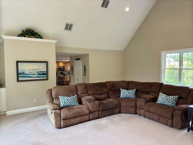 6 Cedar Creek Dr, Attleboro, MA 02703 - living room with baseboards, light carpet, high vaulted ceiling, and visible vents
