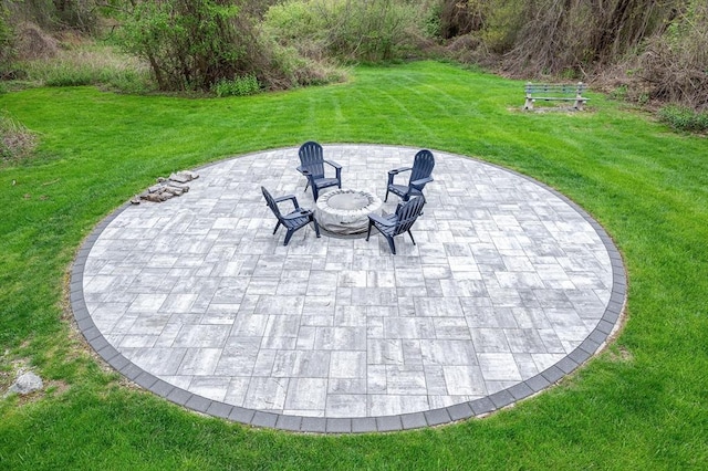 view of patio featuring an outdoor fire pit