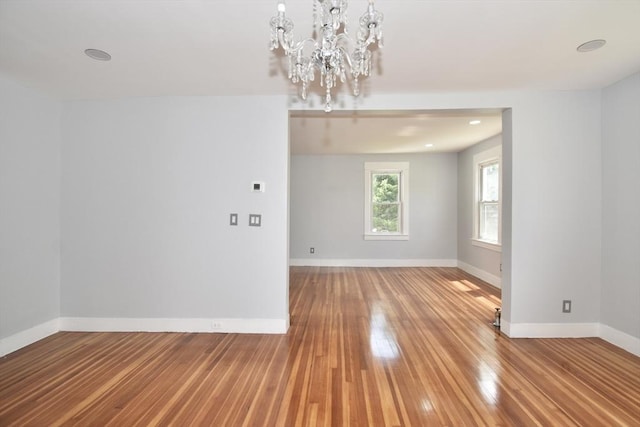176 N Blvd, West Springfield, MA 01089 - empty room with wood-type flooring, a chandelier, and recessed lighting