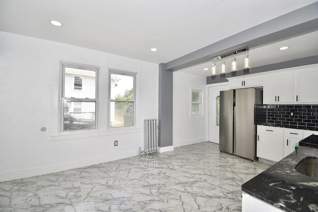 176 N Blvd, West Springfield, MA 01089 - kitchen with freestanding refrigerator, radiator heating unit, white cabinetry, recessed lighting, and dark stone countertops