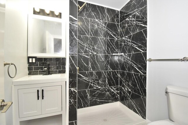 176 N Blvd, West Springfield, MA 01089 - bathroom featuring a shower stall, vanity, and tasteful backsplash