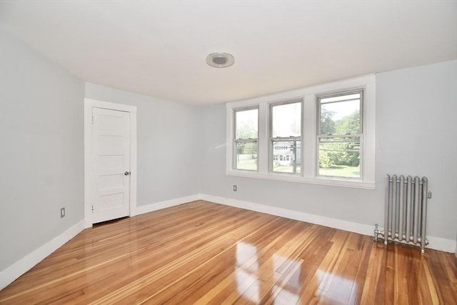 176 N Blvd, West Springfield, MA 01089 - unfurnished room with radiator heating unit and light wood-style floors